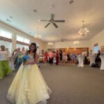 A new bride begins to throw her bouquet